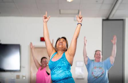 picture of employees at inclusive yoga class